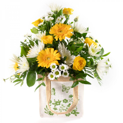 Lemon Drops - This little bag filled with flowers is the perfect way to send your message. Lemon Drops - This little bag filled with flowers is the perfect way to send your message.