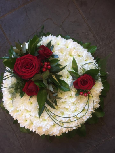 Posy SYM-344 - A delightful funeral posy featuring a white massed base and a red rose spray, handmade by our in-house florists using market fresh flowers. Posy SYM-344 - A delightful funeral posy featuring a white massed base and a red rose spray, handmade by our in-house florists using market fresh flowers.